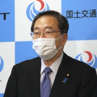 Tourism minister Tetsuo Saito announced a new domestic tourism subsidy program on Monday. | KYODO