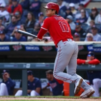 The Angels\' Shohei Ohtani singles against the Twins in Minneapolis on Sunday. | USA TODAY / VIA REUTERS