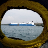 A vessel delivers a cargo of liquefied natural gas to the Arun regasification terminal in North Aceh, Indonesia, in 2015. | REUTERS