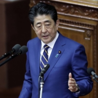 The hallmark of former Prime Minister Shinzo Abe\'s economic legacy was his Abenomics\' “three arrows” principle of monetary easing, fiscal stimulus and structural reform. | BLOOMBERG

