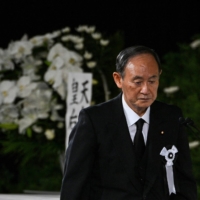 Former Prime Minister Yoshihide Suga, who also served as Abe\'s chief Cabinet secretary during his second term | AFP-JIJI