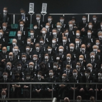 Guests during the state funeral ceremony. Many opposition lawmakers chose not to attend in protest. | POOL / VIA AFP-JIJI