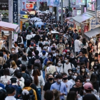 People in Tokyo and other areas gained a level of herd immunity through contagion amid high case counts, new research shows. | AFP-JIJI