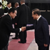 Prime Minister Fumio Kishida welcomes China\'s former science and technology minister, Wan Gang, before a reception at the Akasaka State Guest House in Tokyo following the state funeral for former Prime Minister Shinzo Abe. | POOL / VIA REUTERS