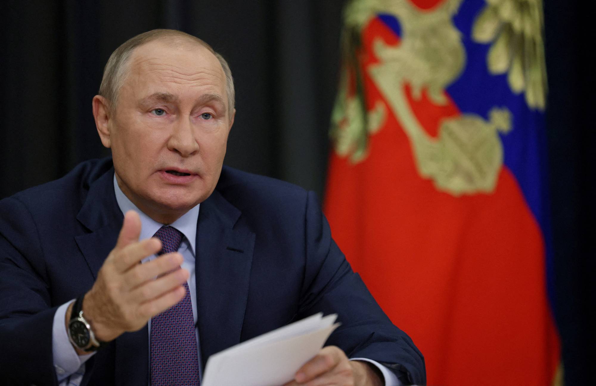 Russian President Vladimir Putin chairs a meeting via videoconference in Sochi, Russia, on Tuesday. | SPUTNIK / POOL / VIA REUTERS
