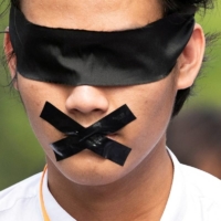 A demonstrator protests against the military coup in Yangon, Myanmar, in February 2021. |  REUTERS