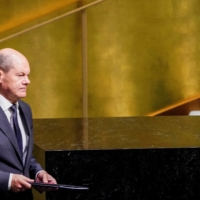 Germany\'s Chancellor Olaf Scholz prepares to address the 77th Session of the United Nations General Assembly at U.N. Headquarters in New York City on Sept. 20. | REUTERS