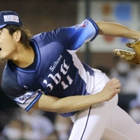 Lions pitcher Tatsuya Imai pitches against the Eagles in Sendai on Wednesday. | KYODO