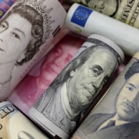 The financial turmoil emanating from Britain and Japan is not yet enough to prompt the U.S. Treasury to intervene to buoy the battered pound or yen, with officials showing no urgency to act. | REUTERS