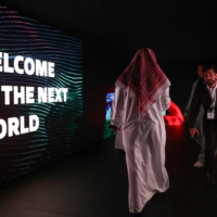 People attend the Next World Forum for esports Riyadh on Sept. 7. Much like with Formula One and professional golf, Saudi Arabia, the world\'s biggest oil exporter, has in recent years leveraged its immense wealth to assert itself on the esports stage. | AFP-JIJI