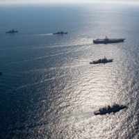 South Korean and U.S. naval vessels, including aircraft carrier USS Ronald Reagan, take part in a joint exercise off South Korea\'s coast on Thursday. | SOUTH KOREAN NAVY / VIA YONHAP / VIA REUTERS