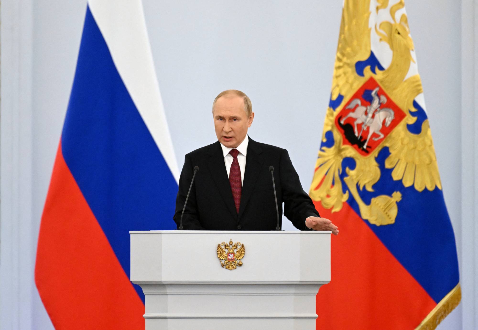 Russian President Vladimir Putin delivers a speech during a ceremony to declare the annexation of Ukranian territory, in Moscow on Friday.  | SPUTNIK / KREMLIN / VIA REUTERS