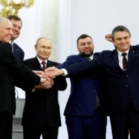 Russian President Vladimir Putin attends a ceremony with the Russian-installed leaders of Ukraine\'s Donetsk, Luhansk, Kherson and Zaporizhzhia regions to declare their annexation, at the Kremlin in Moscow on Friday.  | SPUTNIK / POOL / VIA REUTERS
