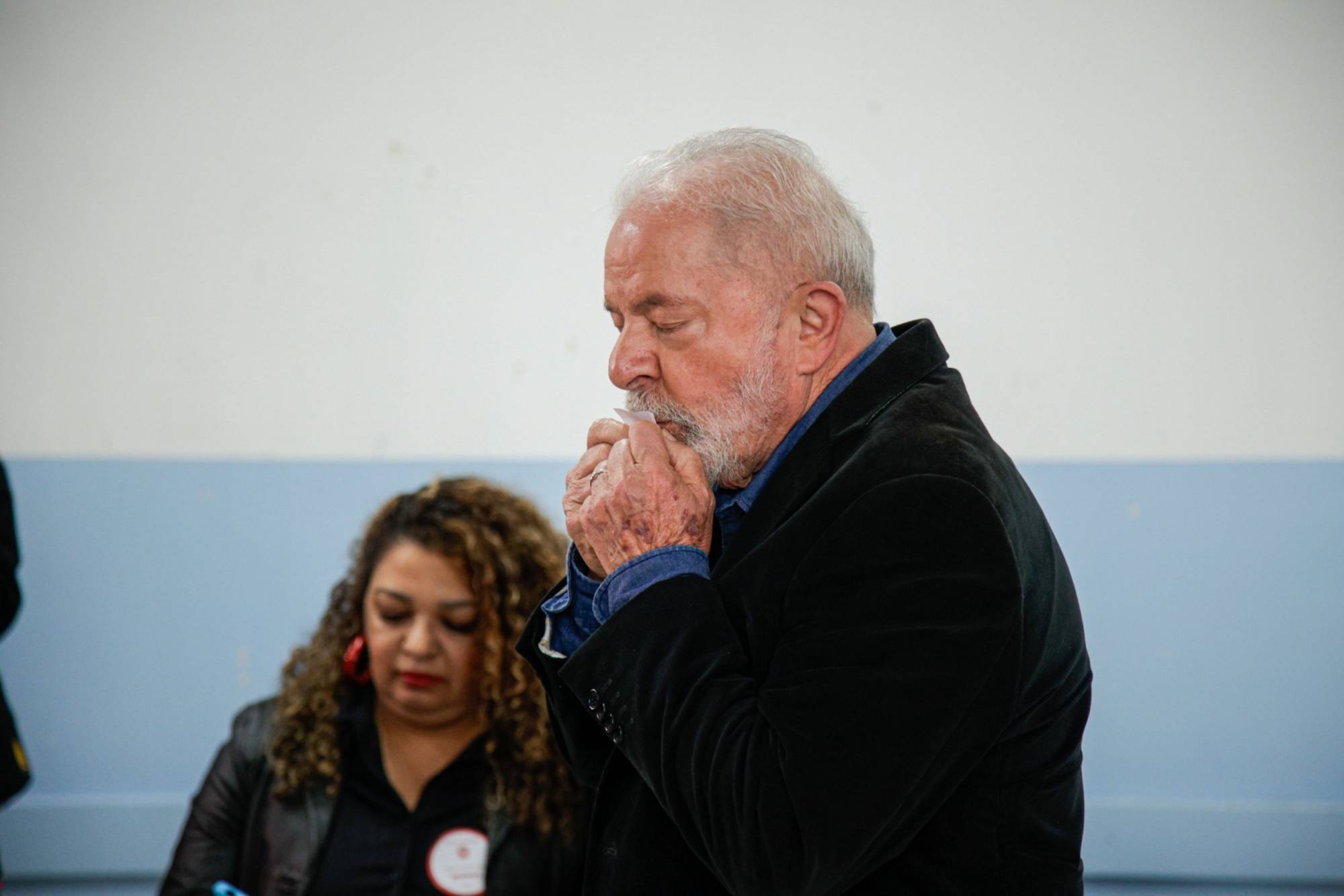 Da Silva kisses his ballot in Sao Bernardo do Campo, Brazil, on Sunday. | Bloomberg