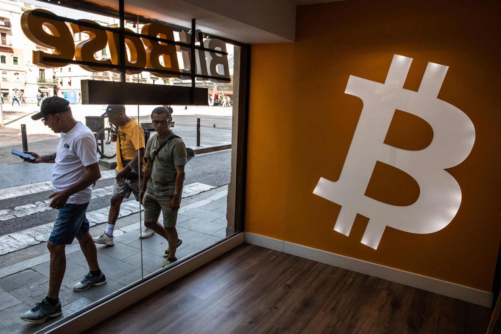 A cryptocurrency exchange in Barcelona. Long-term holders of crypto assets believe there’s more pain to come in the market. | BLOOMBERG