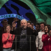 Da Silva (center), who received 48.4% of the vote versus 43.2% for Bolsonaro, in Sao Paulo on Sunday | VICTOR MORIYAMA / THE NEW YORK TIMES