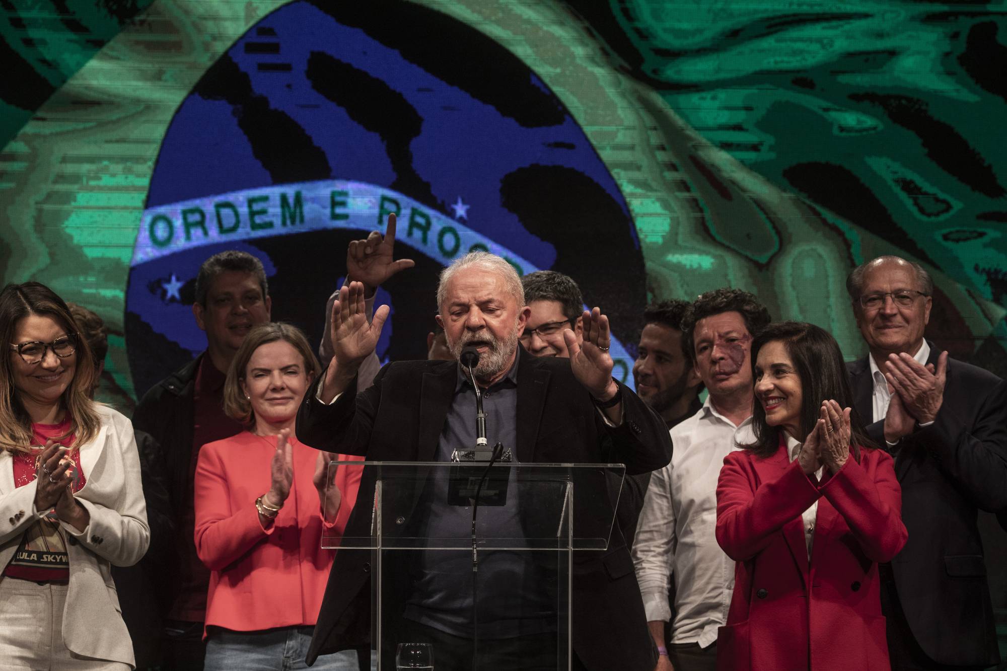 Da Silva (center), who received 48.4% of the vote versus 43.2% for Bolsonaro, in Sao Paulo on Sunday | Victor Moriyama / The New York Times