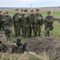 Newly mobilized reservists take part in training on a range in Russia\'s Rostov region on Tuesday. | REUTERS 