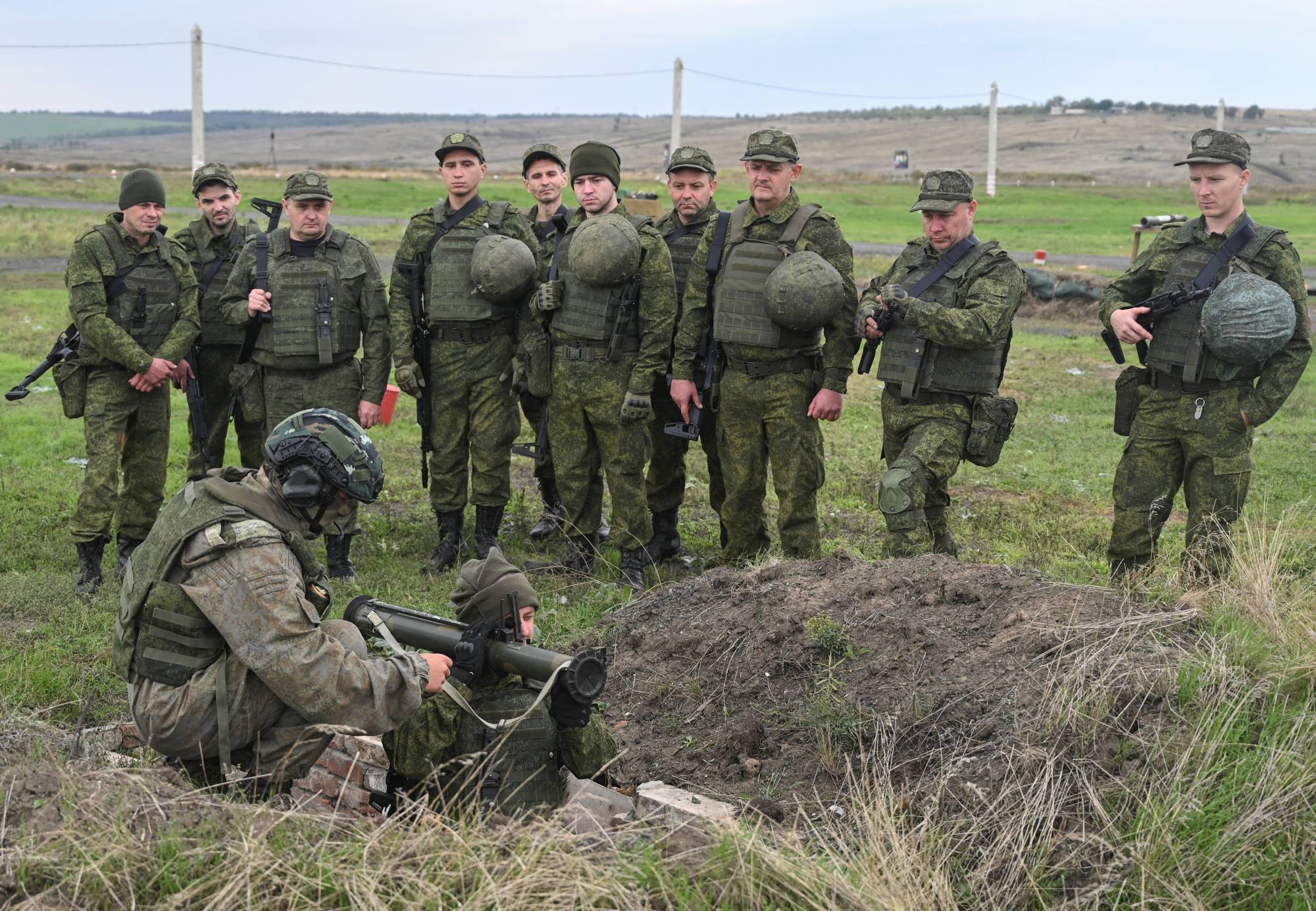 Newly mobilized reservists take part in training on a range in Russia's Rostov region on Tuesday. | REUTERS 