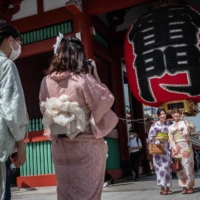 People visit Sensoji temple, a popular tourist destination, in Tokyo on Sept. 13. | AFP-JIJI