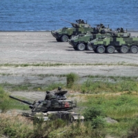 Taiwanese military personnel during a military exercise in New Taipei City on July 27 | LAM YIK FEI / THE NEW YORK TIMES