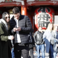 Tourists visit Tokyo\'s Asakusa district on Jan. 10, 2020. | KYODO
