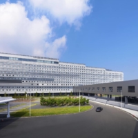 A rendering of Sumitomo Realty and Development\'s planned hotel complex directly connected to Haneda airport in Tokyo | SUMITOMO REALTY AND DEVELOPMENT CO. / VIA KYODO