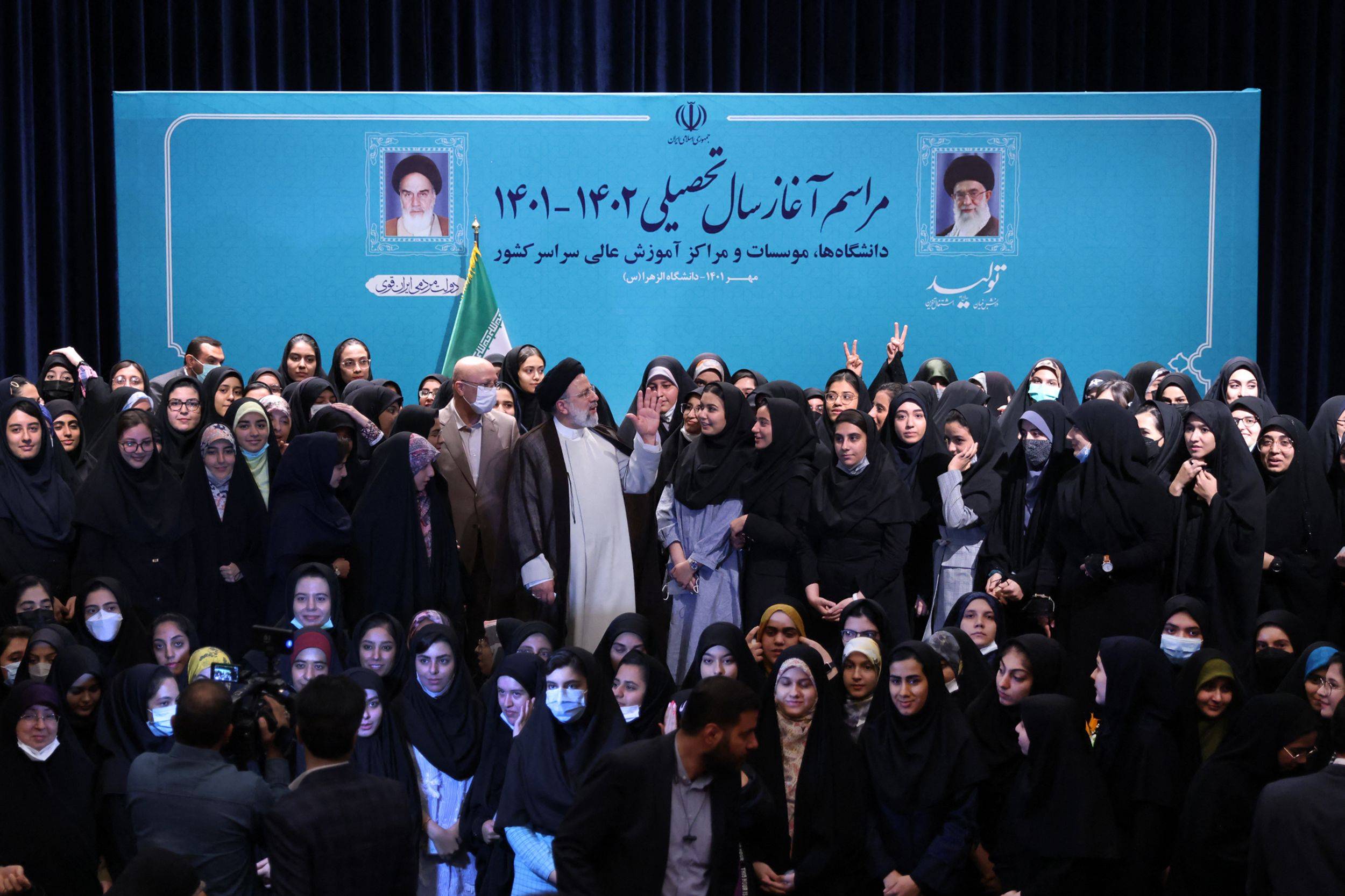 Iranian President Ebrahim Raisi speaks to female students during a ceremony marking the beginning of the academic year, at Tehran's Al-Zahra university on Saturday. | IRANIAN PRESIDENCY / VIA  AFP-JIJI