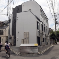 A building housing tiny apartments in Tokyo on Aug. 24. New apartments in Japan are pushing the boundaries of normal living.  | NORIKO HAYASHI / THE NEW YORK TIMES