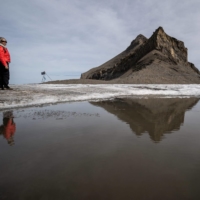 The thick layer of ice that once covered a Swiss mountain pass between Scex Rouge glacier and Tsanfleuron glacier since at least the Roman era has melted away completely. | AFP-JIJI