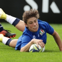 Italy\'s Aura Muzzo scores the team\'s third try against the United states during their women\'s Rugby World Cup Pool B opener in Whangarei, New Zealand, on Sunday. | REUTERS