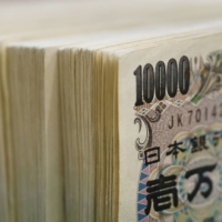 One-week implied volatility in the dollar-yen has fallen to trade well below highs seen last month, even as the currency pair closes on ¥145.90 per dollar — a level that triggered a near $20 billion intervention from the Finance Ministry. | BLOOMBERG