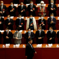 Chinese President Xi Jinping arrives for the opening session of the National People\'s Congress at the Great Hall of the People in Beijing on March 5. | REUTERS