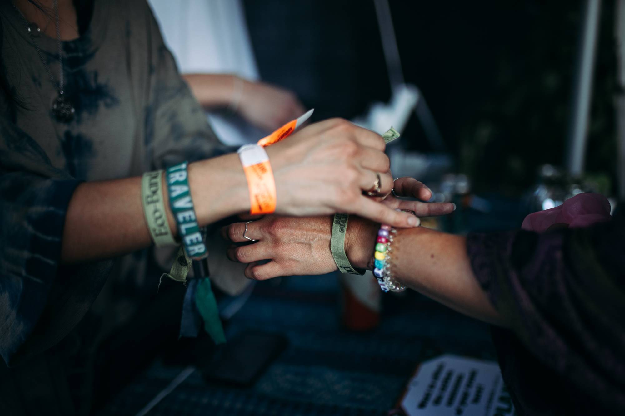 A group called Green Disco sells 'eco-bands' that will offset carbon emissions at Deep Tropics at Bicentennial Capitol Mall State Park in Nashville, Tenn., on Aug. 27. | Taylor Baucom / The New York Times