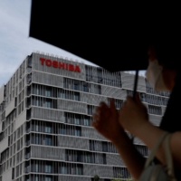 A consortium led by Japan Industrial Partners has been granted preferred bidder status for a buyout of Toshiba, according to sources. | REUTERS