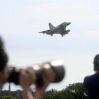 A Taiwan Air Force Mirage 2000-5 aircraft lands at Hsinchu Air Base in Hsinchu, Taiwan, on Aug. 7. | REUTERS