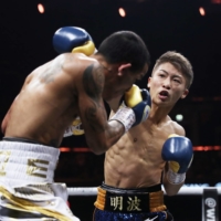 Naoya Inoue punches Emmanuel Rodriguez during their IBF title fight in Glasgow on May 18, 2019. | REUTERS