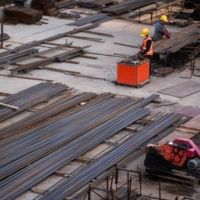 Workers at a construction site in Shanghai on Monday. Xi\'s \"COVID zero\" policy, the crackdown on tech and geopolitical tensions are some of the many uncertainties that hang over China\'s economy. | REUTERS