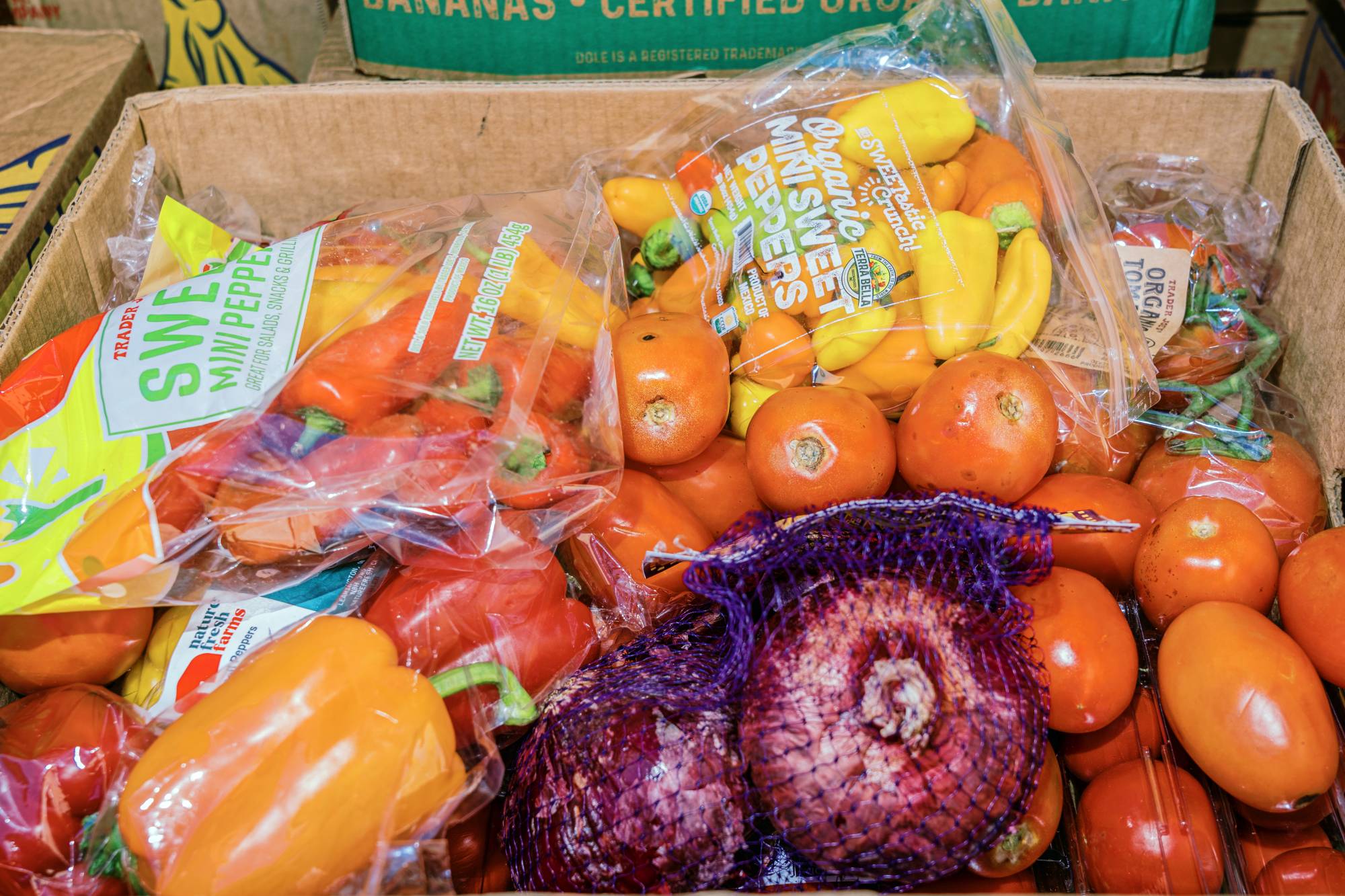 Donated food is collected from a Trader Joe's in Fresno. By one estimate, 70% to 90% of wasted food is edible. | Andri Tambunan / The New York Times