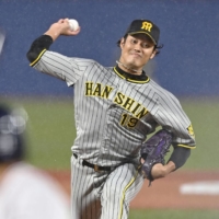 Shintaro Fujinami has clocked 162 kph with his fastest pitch and was considered the pitching rival of Los Angeles Angels two-way star Shohei Ohtani during high school and early in their professional careers. | KYODO 