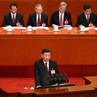 Chinese leader Xi Jinping speaks during the opening session of the 20th Chinese Communist Party\'s Congress at the Great Hall of the People in Beijing on Sunday. | AFP-JIJI
