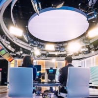 The Fox Weather television studio during a rehearsal in New York in 2021. Rupert Murdoch’s plan to combine News Corp. and Fox, recreating the conservative-leaning media goliath that he split apart nine years ago, is drawing mixed reactions on Wall Street. | BLOOMBERG