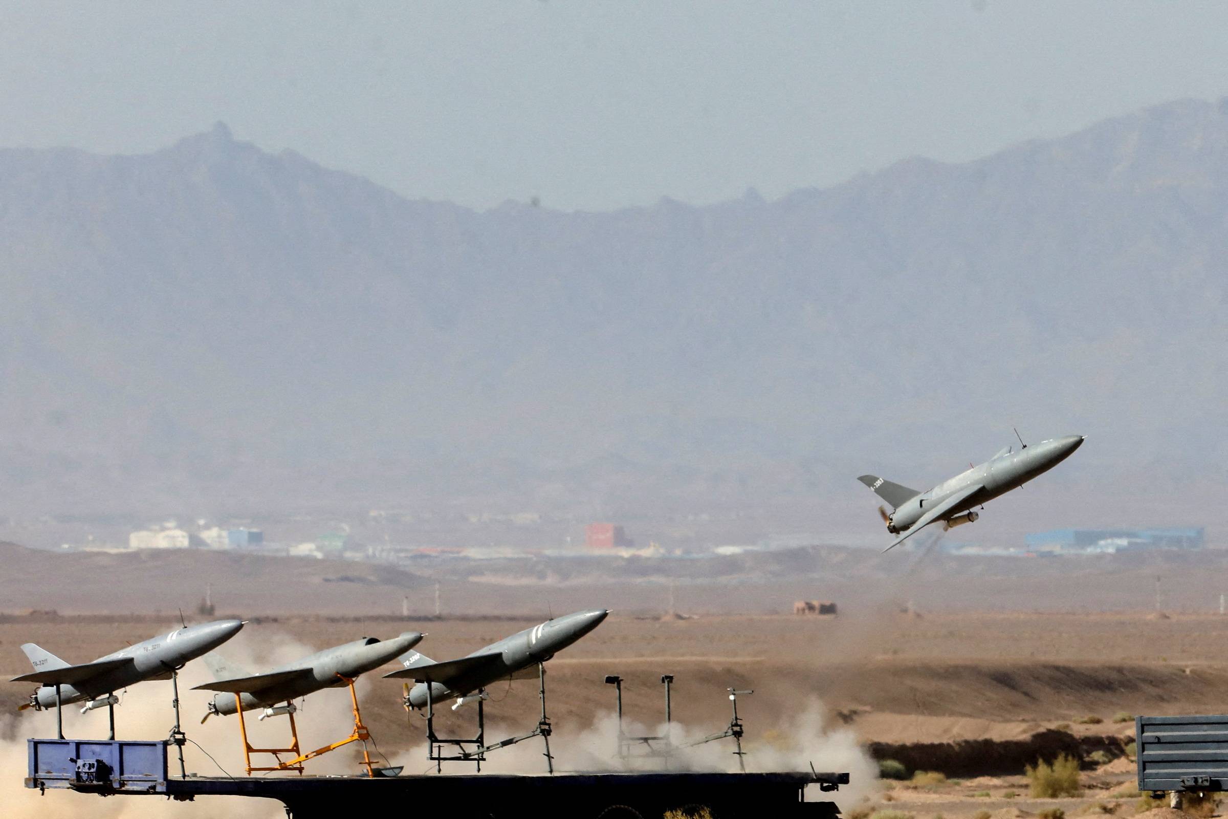 A drone is launched during a military exercise at an undisclosed location in Iran in August. | IRANIAN ARMY / WEST ASIA NEWS AGENCY / VIA REUTERS 