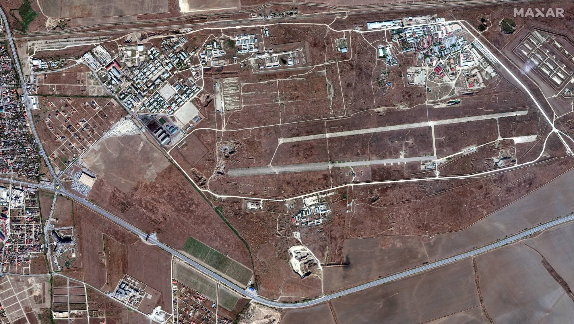 A satellite-image view of the Khankala airbase where thousands of people gathered for military demonstrations and a rally to honor Russian President Vladimir Putin on his 70th birthday, in Grozny, Chechen Republic, Russia, on Oct. 7 | MAXAR TECHNOLOGIES / VIA REUTERS 