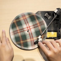 Studio Poetic Curiosity’s playable record, made from recycled waste textiles, is on display at the Itochu SDGs Studio. | MINA ASABA
