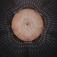 Product designer Mai Suzuki explores new ways to use traditional Japanese kumiko woodworking lattice techniques with her decorative hemispherical lamps, which are on display at Kaisu in Minato Ward. | COURTESY OF DESIGNART 2022
