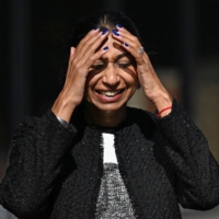 Then-British Home Secretary Suella Braverman in London on Sept. 17. Braverman has left the government, fueling suspicions that the new government of Prime Minister Liz Truss was already unraveling. | POOL / VIA AFP-JIJI