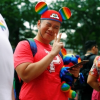 A participant of Pink Dot, an annual event organized in support of the LGBTQ community, at the Speakers\' Corner in Hong Lim Park in Singapore in June 2019 | REUTERS