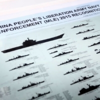 A chart of Chinese military ships on the bridge of the Maritime Self-Defense force ship Umigiri prior to Japan-Australia joint military exercises in Sydney in April 2016. | REUTERS