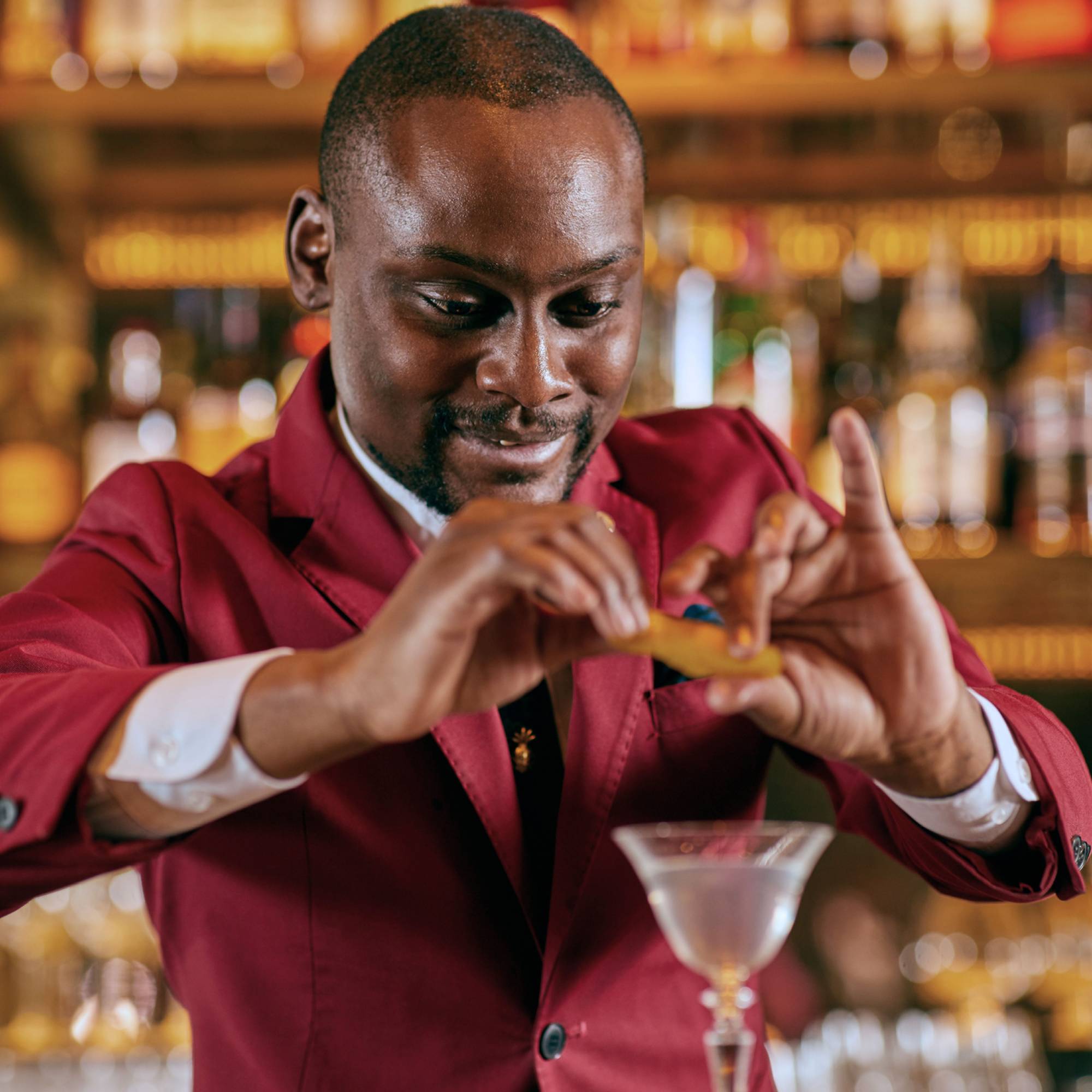 Keith Motsi is a energetic bartender with equal zeal for mixing drinks and mixing with customers. | COURTESY OF FOUR SEASONS